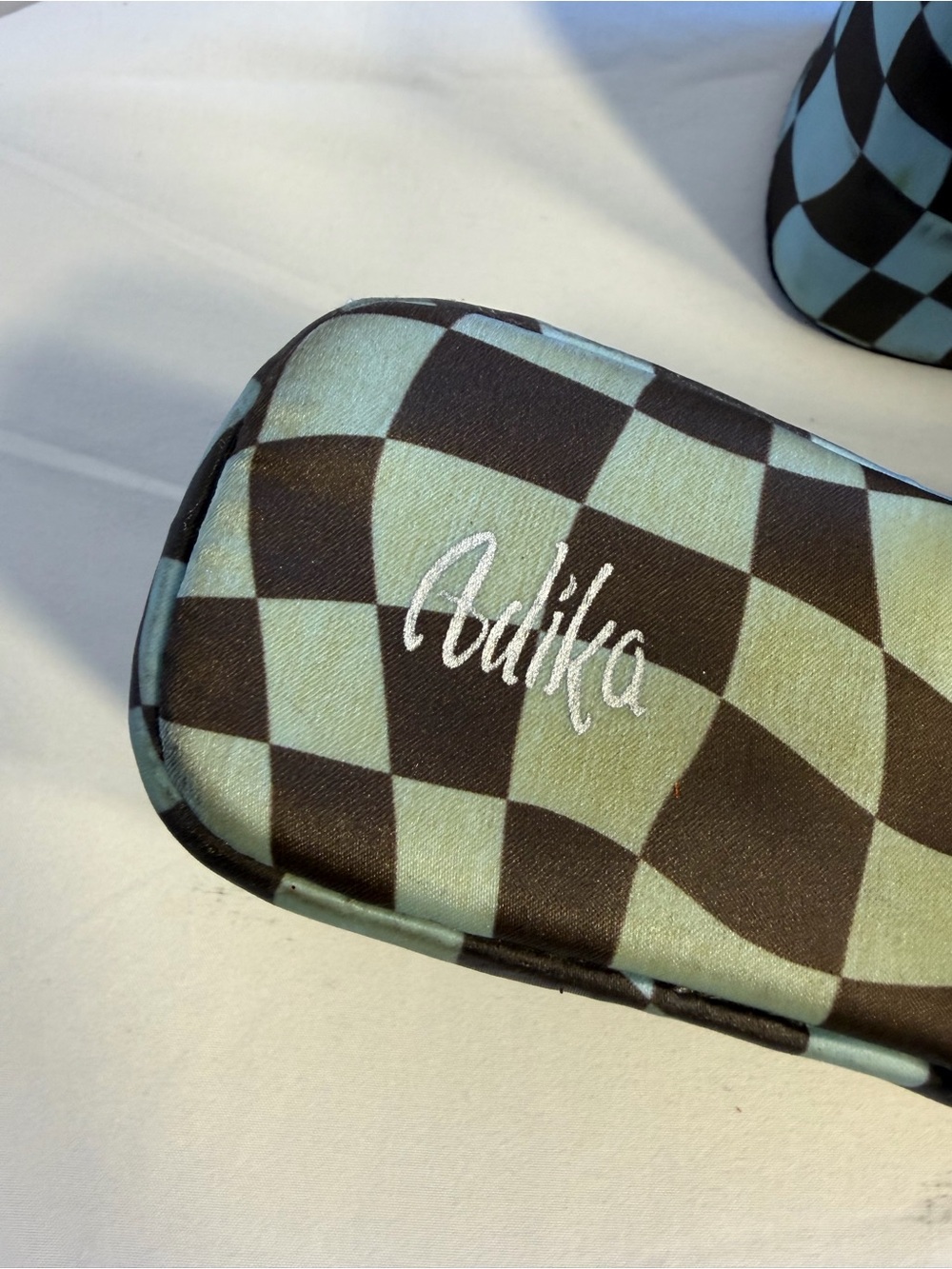 Adika Checkerboard Slide Sandals in Mint Green and Black